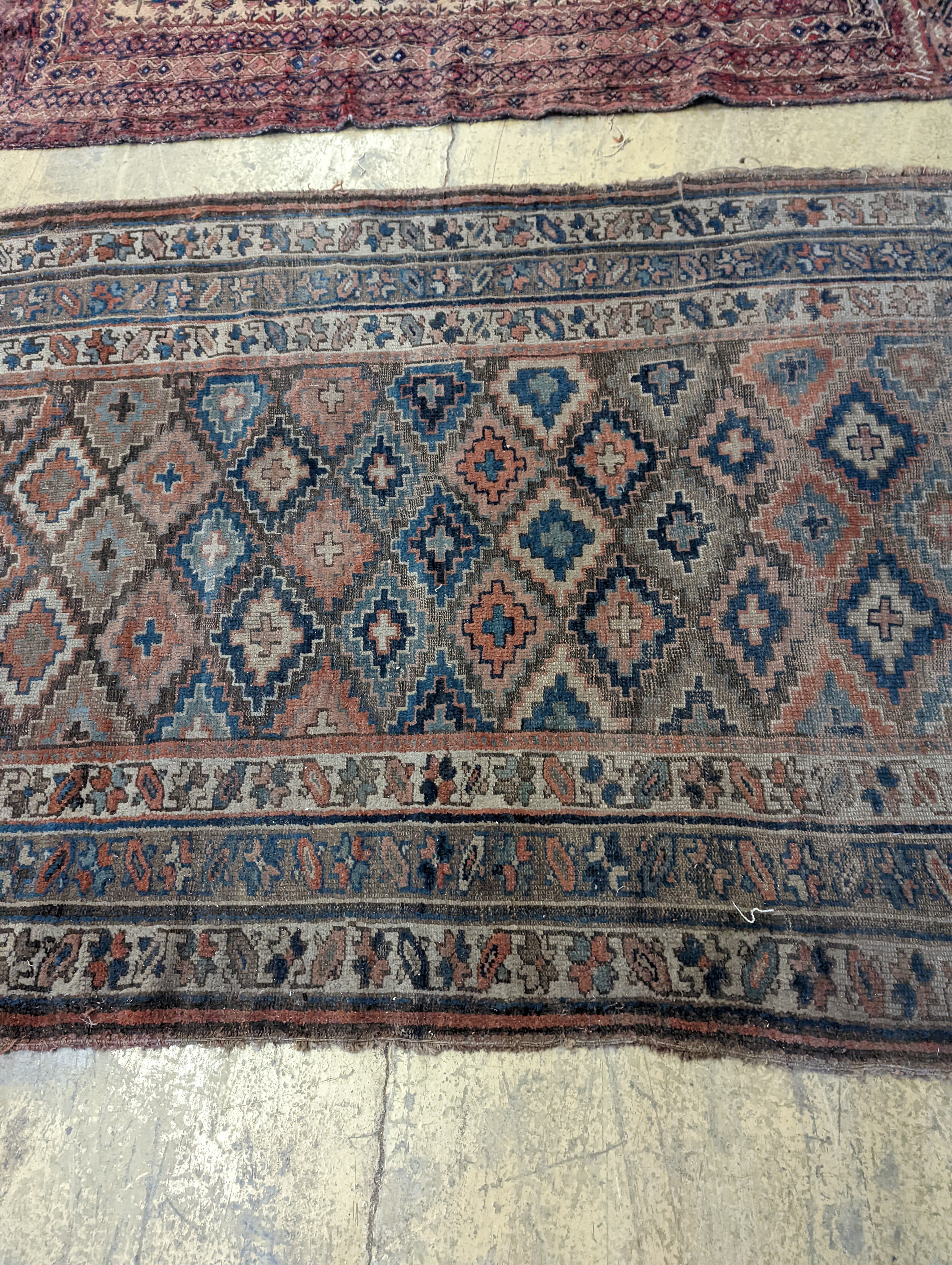 An antique Caucasian runner and a Belouch rug, larger 284 x 134cm